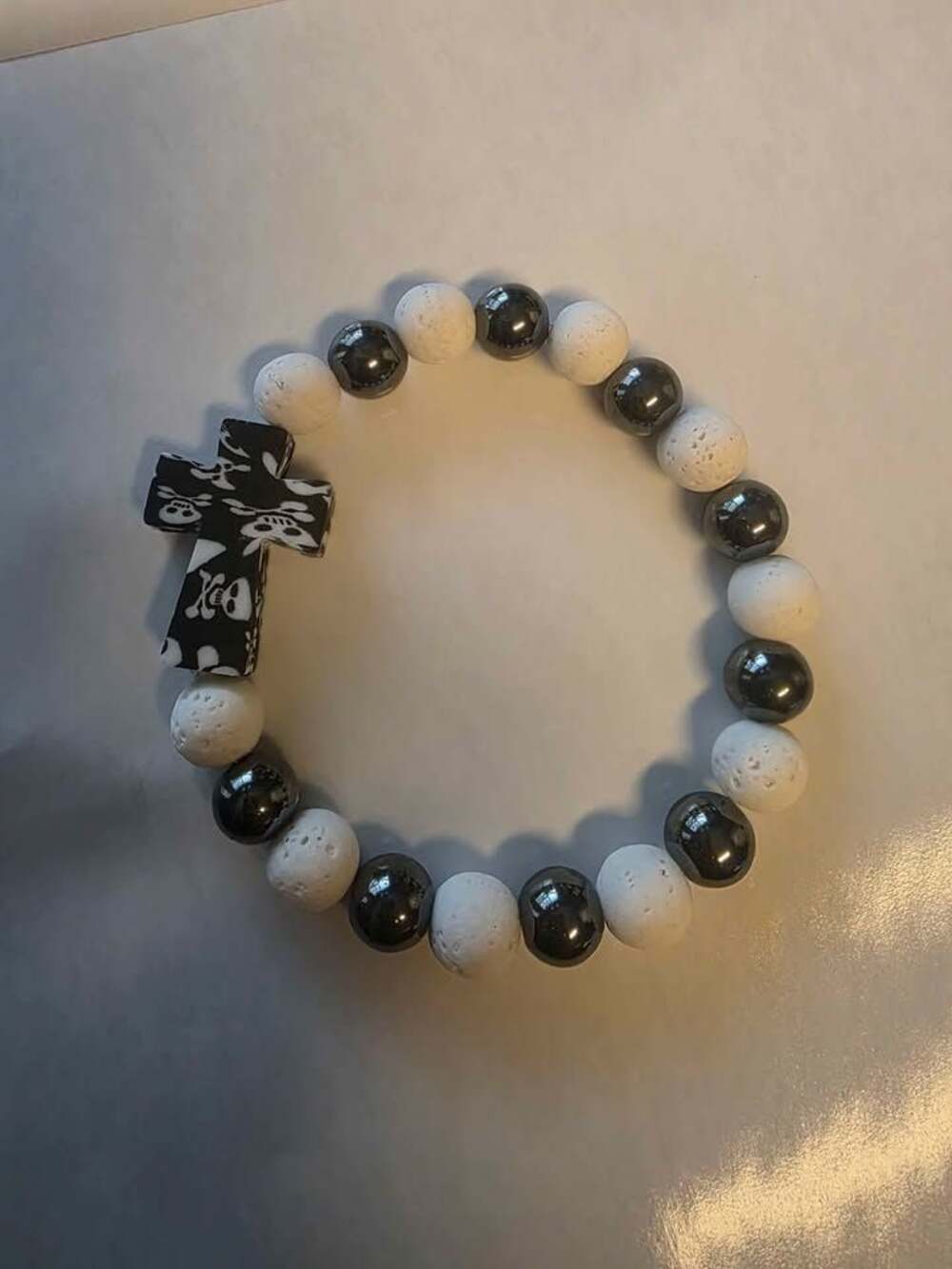 Skull Cross Lava Rock and Hematite Bead Bracelet